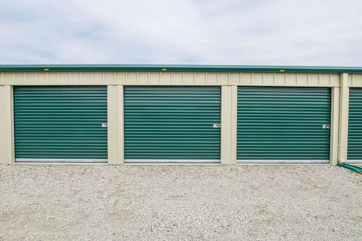 Multiple self storage units easy drive up green doors
